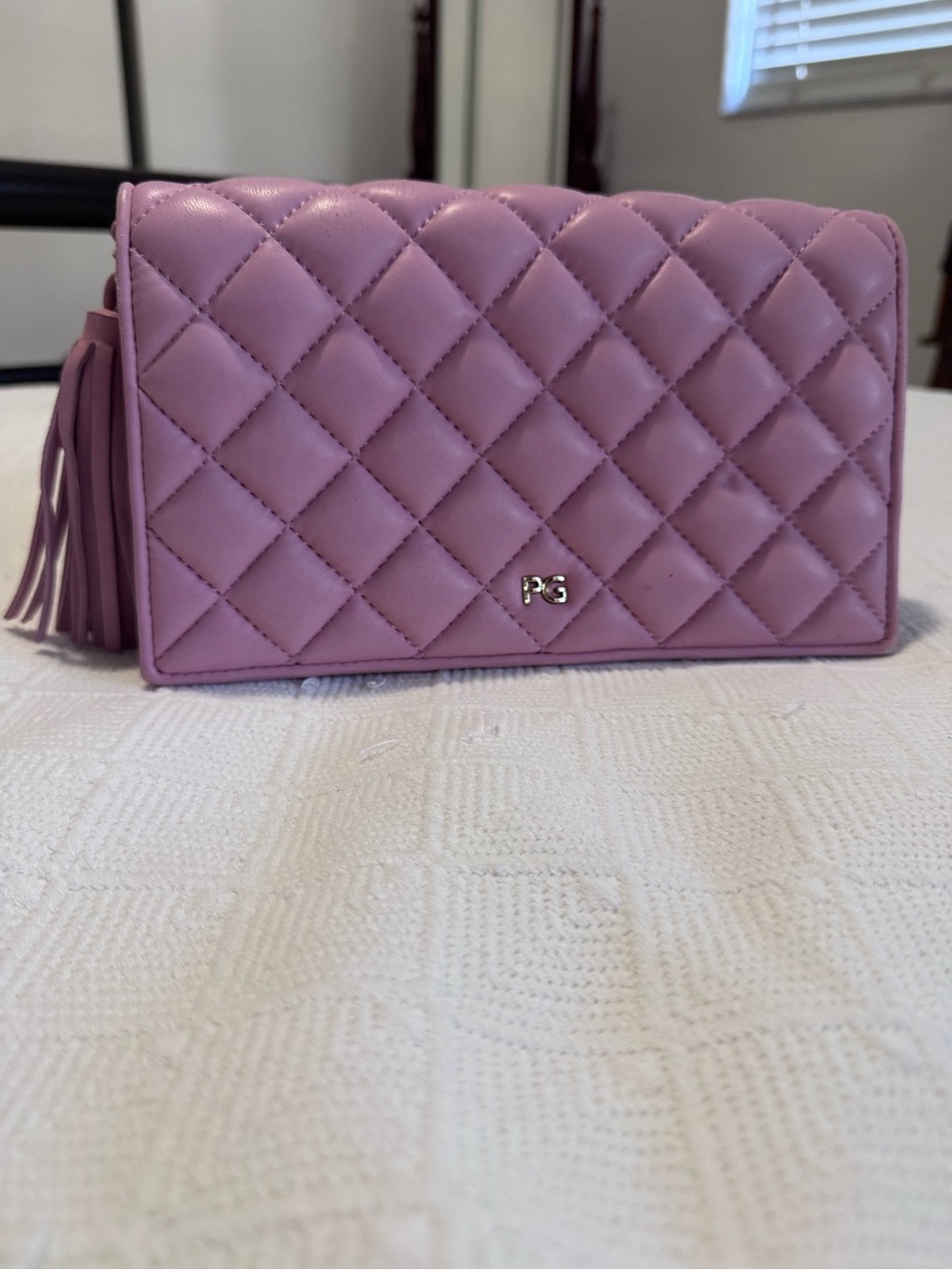 Quilted pink/mauve Crossbody Bag with Tassel